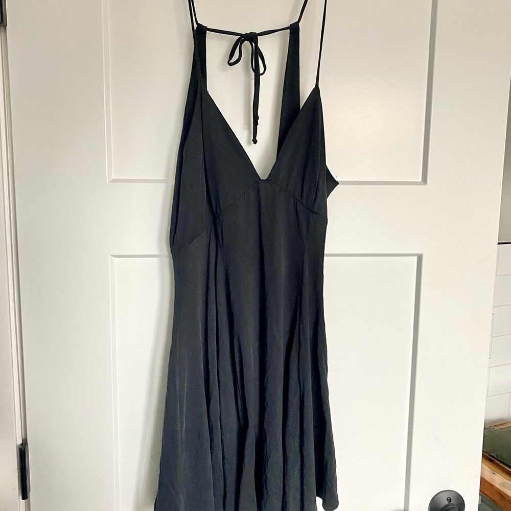 Backless Skater dress with deep V-neckline.